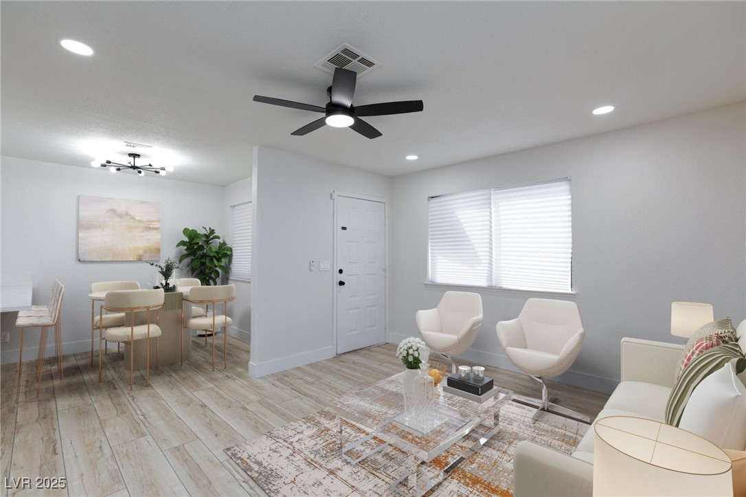 5905 Smoke Ranch Road, Unit A Las Vegas, NV 89108 - Photo 6 of 31 Living area with light wood-style flooring, plenty of natural light, recessed lighting, and ceiling fan