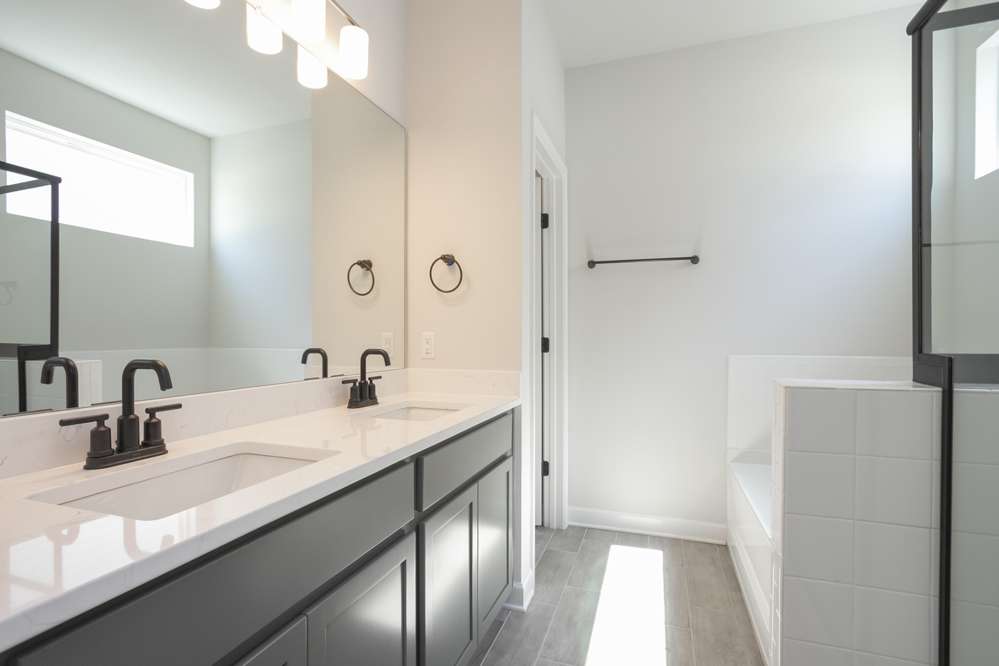 128 Millbrook Dr Spring Hill Spring Hill, TN 37174 - Photo 14 of 19 a bathroom with a sink and a mirror