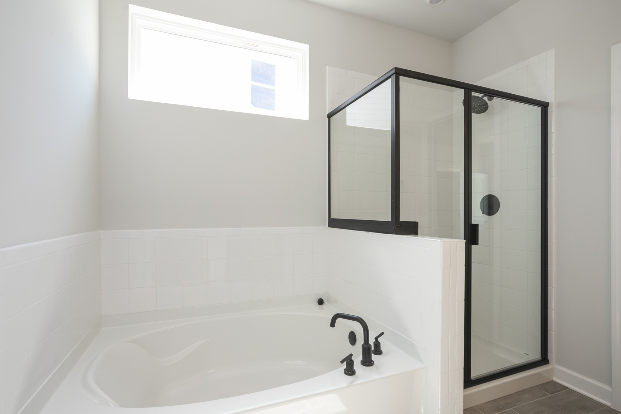 128 Millbrook Dr Spring Hill Spring Hill, TN 37174 - Photo 15 of 19 a bathroom with a shower and a bathtub