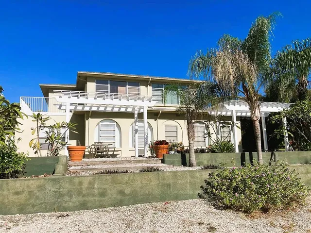 a view of a house with a swimming pool