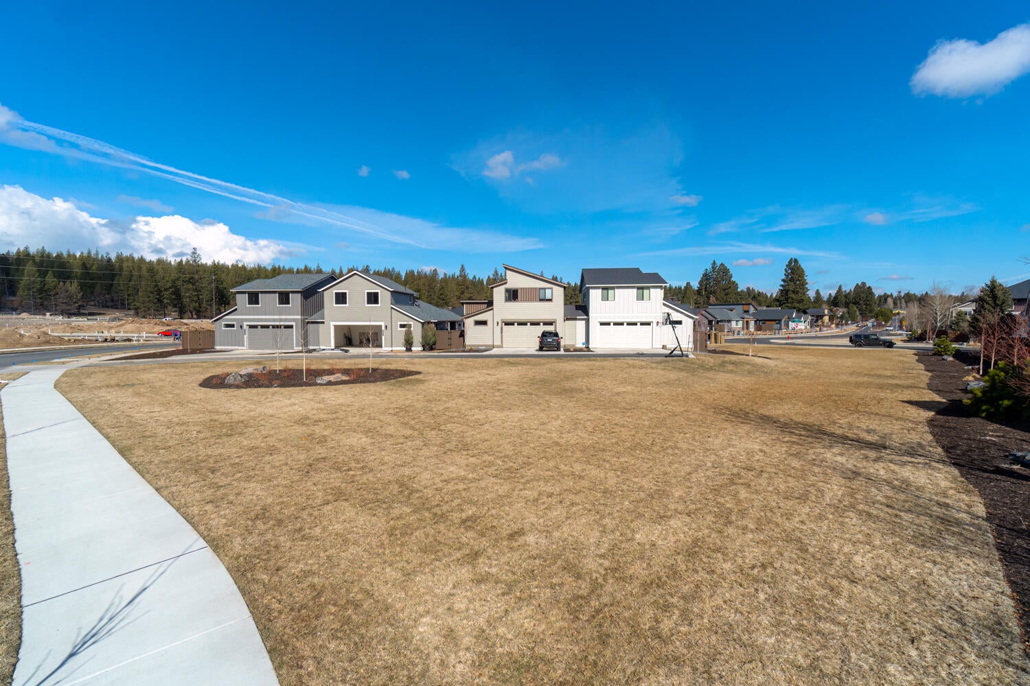 2297 Northwest Skyline Ranch Road Bend, OR 97703 - Photo 15 of 16 Multiple common green spaces in the community.