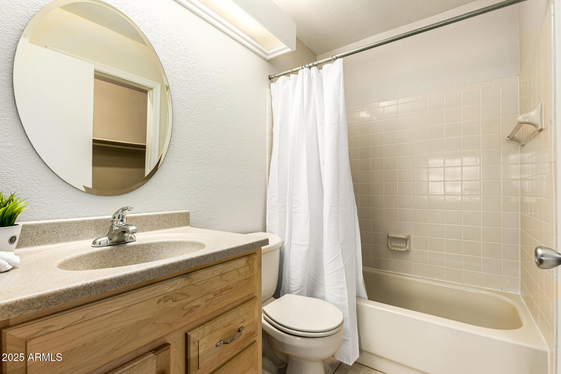 1312 East Stephens Drive Tempe, AZ 85283 - Photo 19 of 26 a bathroom with a sink toilet and shower