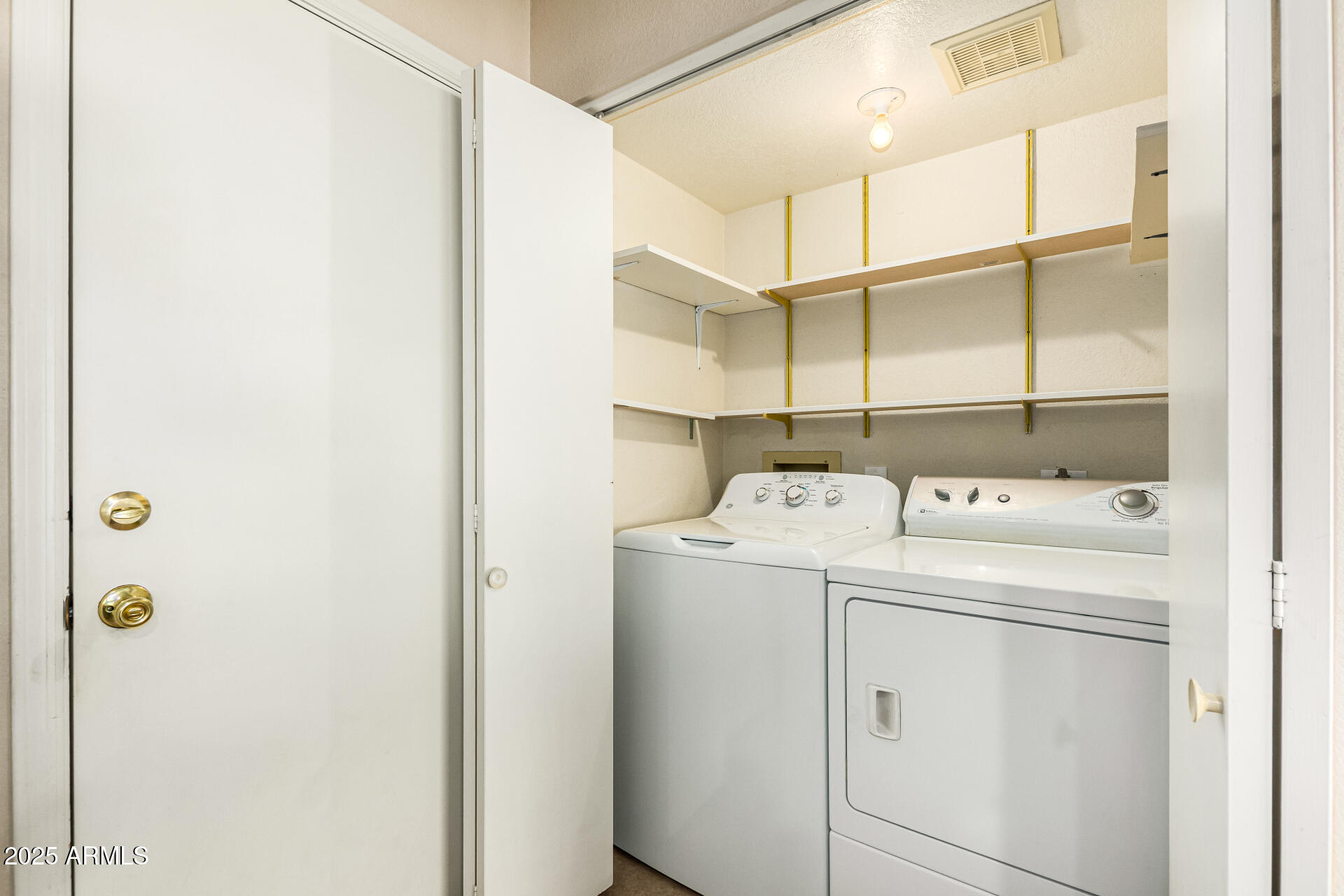 1312 East Stephens Drive Tempe, AZ 85283 - Photo 21 of 26 a utility room with dryer and washer