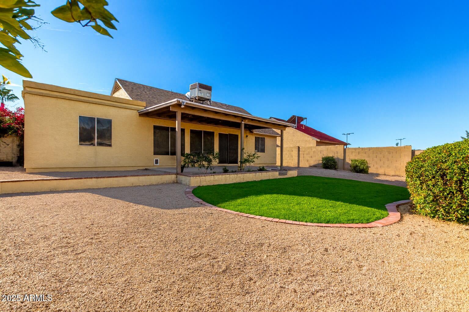 1312 East Stephens Drive Tempe, AZ 85283 - Photo 24 of 26 a front view of a house with garden