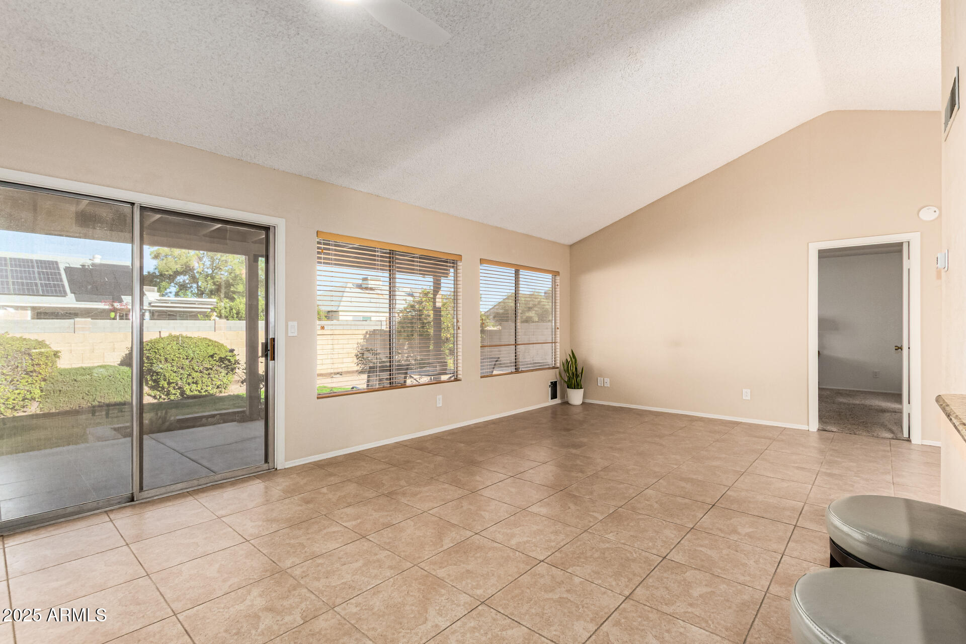 1312 East Stephens Drive Tempe, AZ 85283 - Photo 6 of 26 a view of an empty room with glass door