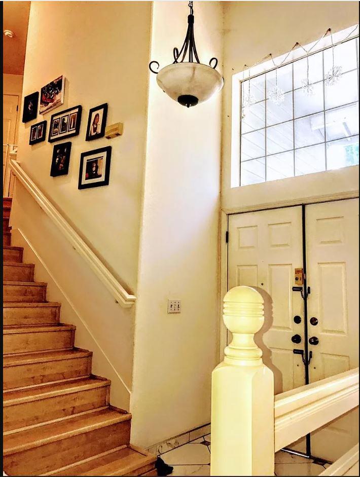 581 Hellyer Avenue San Jose, CA 95111 - Photo 3 of 8 a front view of a house with wooden floor