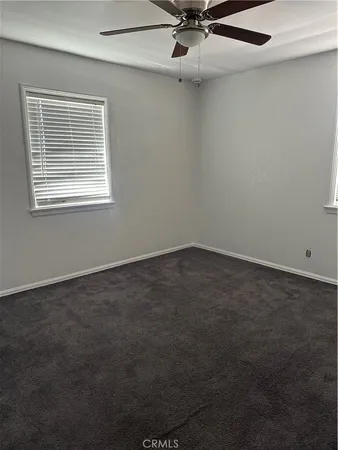a view of a room that has a window in it