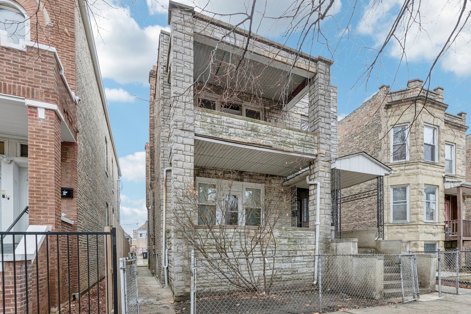 1912 South Harding Avenue Chicago, IL 60623 - Photo 1 of 16 a front view of a house
