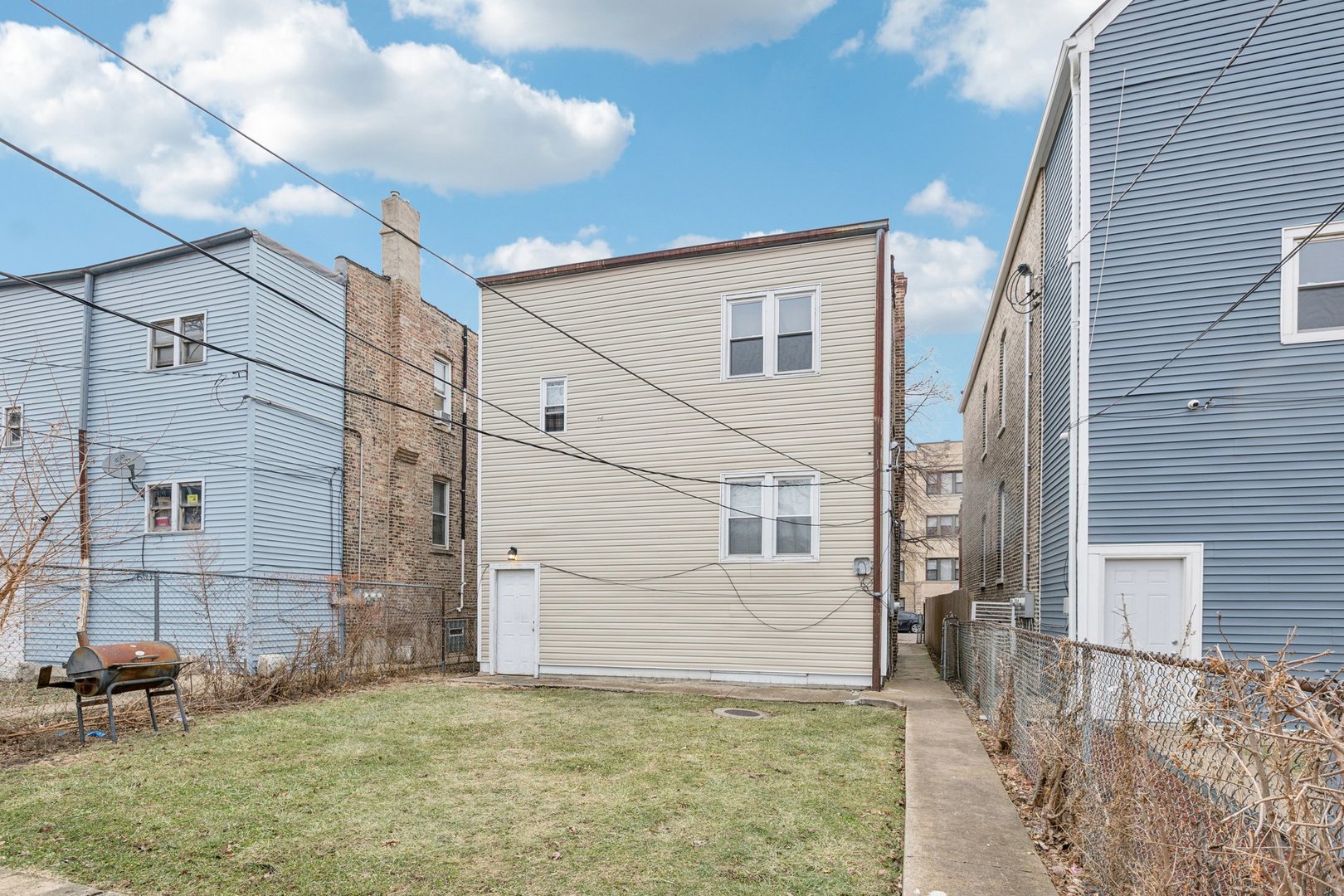 1912 South Harding Avenue Chicago, IL 60623 - Photo 14 of 16 a view of a backyard of the house