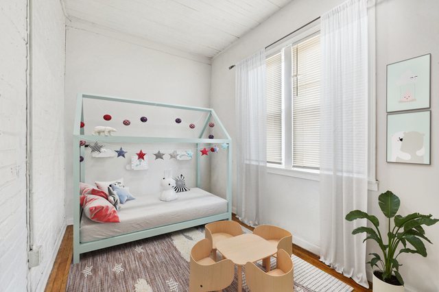 1912 South Harding Avenue Chicago, IL 60623 - Photo 9 of 16 a bedroom with furniture and a wooden floor