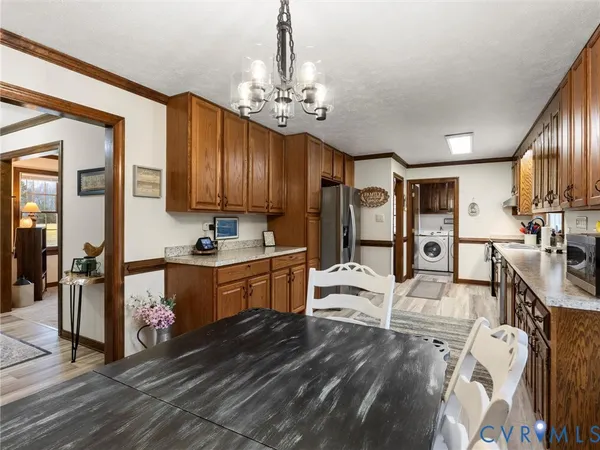 a kitchen with a refrigerator and a sink
