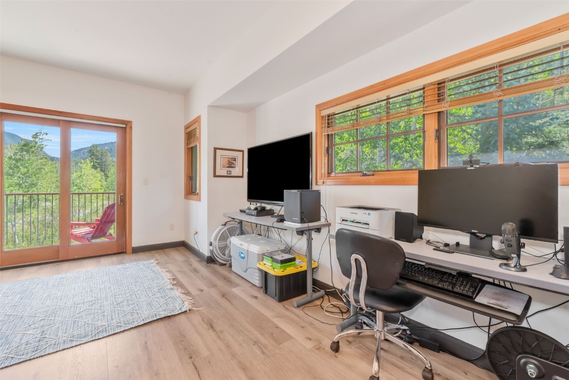 2911 Inverness Way Steamboat Springs, CO 80487 - Photo 37 of 43 a workspace with furniture and flat screen tv