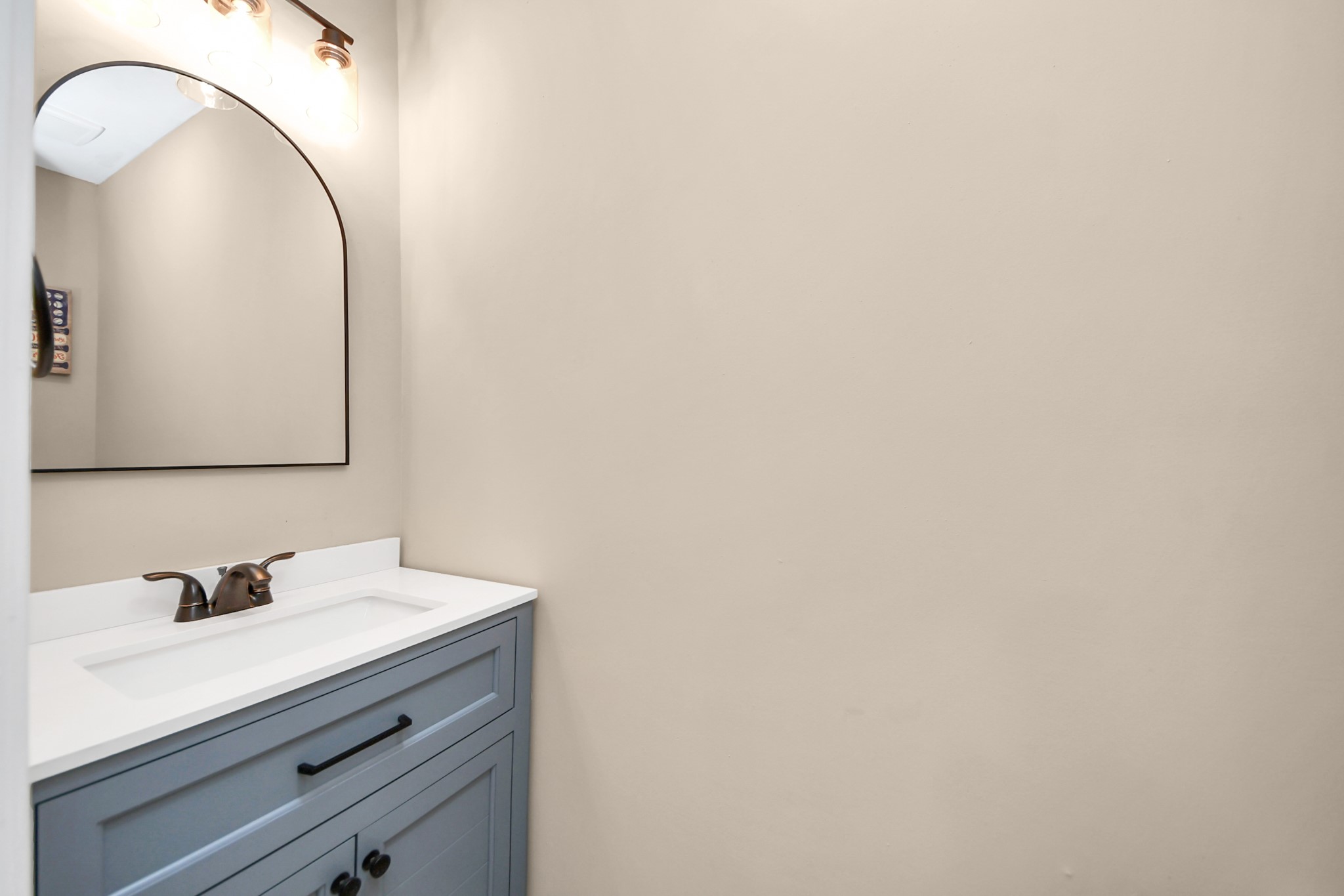 19030 Keyturn Lane Humble, TX 77346 - Photo 11 of 50 a bathroom with a sink and a mirror