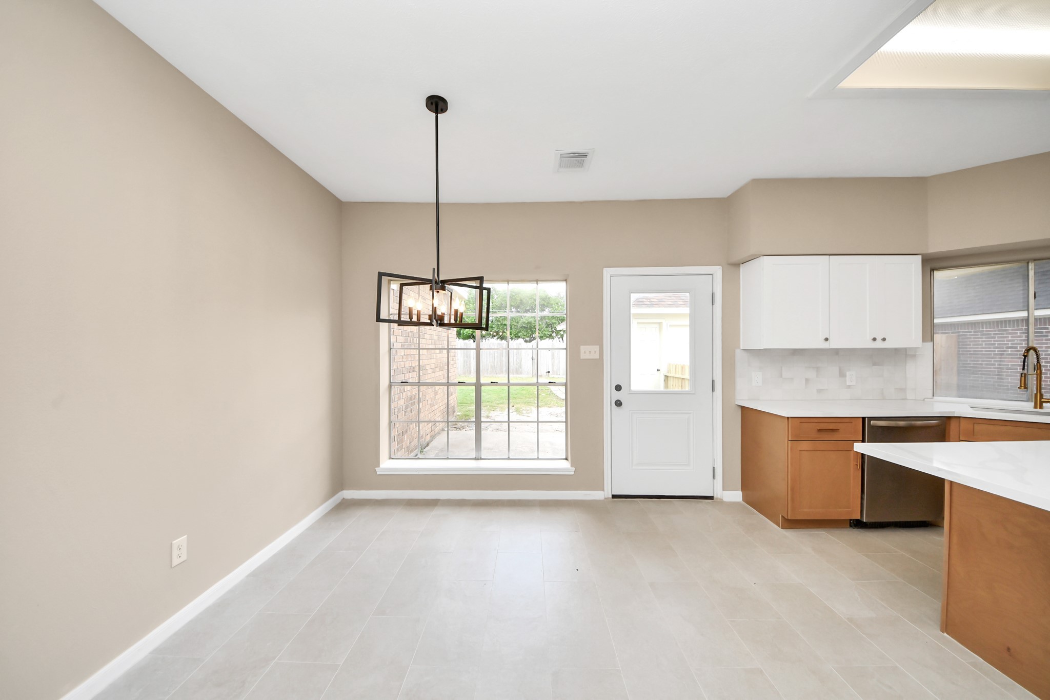 19030 Keyturn Lane Humble, TX 77346 - Photo 12 of 50 a view of an empty room with a window