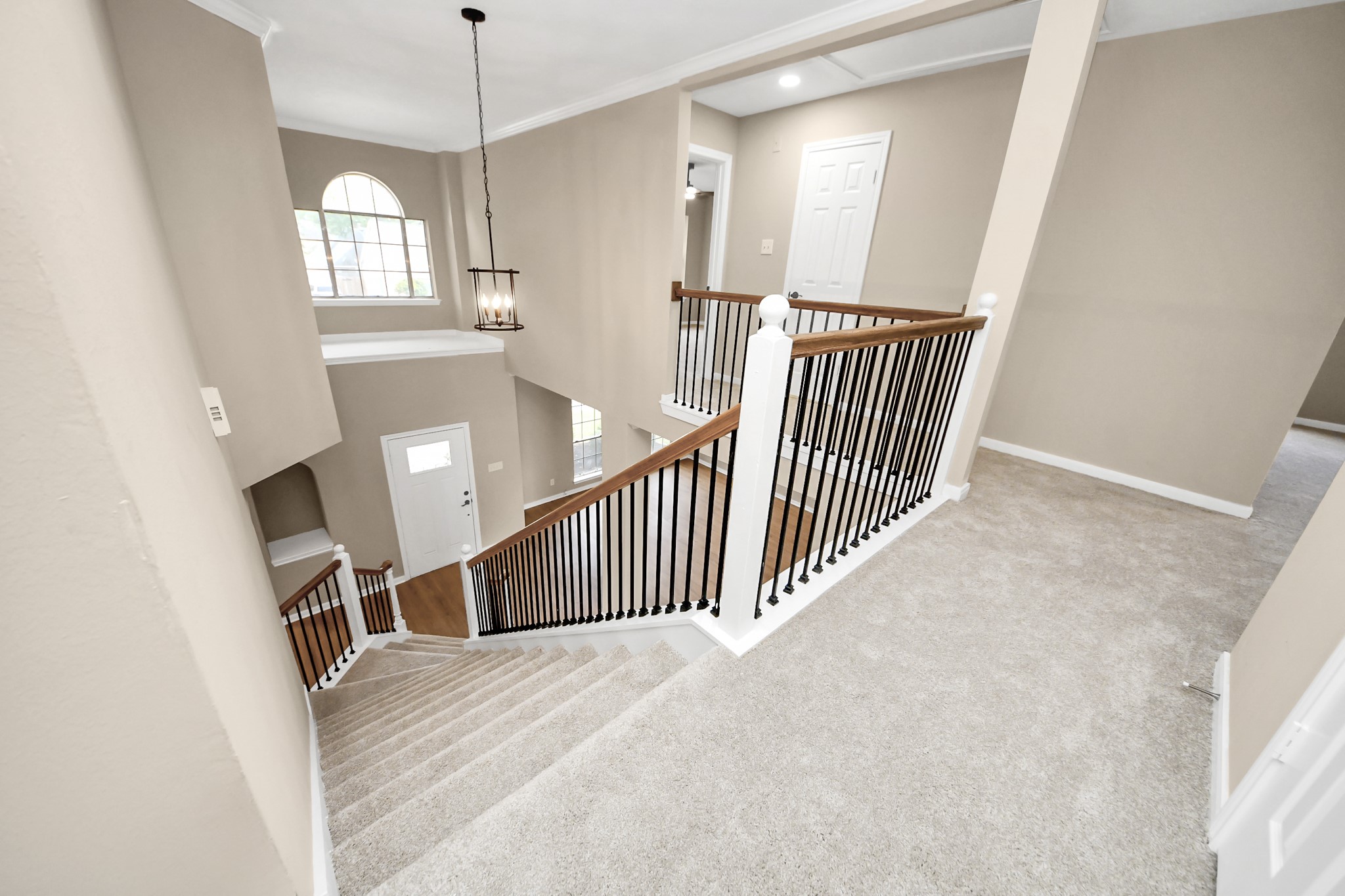 19030 Keyturn Lane Humble, TX 77346 - Photo 28 of 50 a view of hallway with stairs and wooden floor