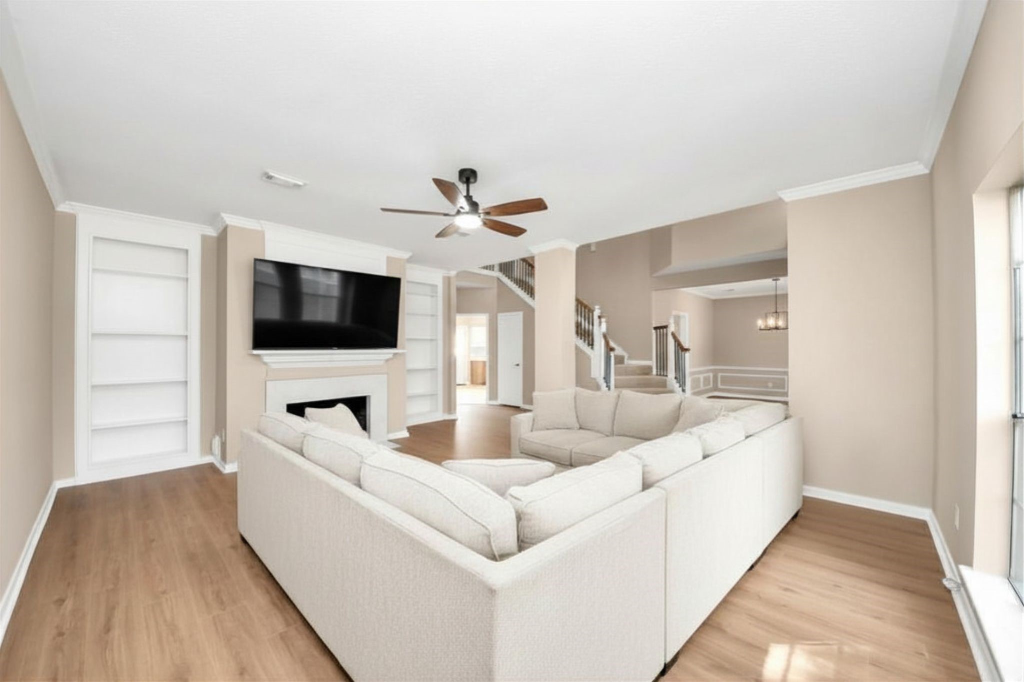 19030 Keyturn Lane Humble, TX 77346 - Photo 3 of 50 a living room with furniture and a flat screen tv