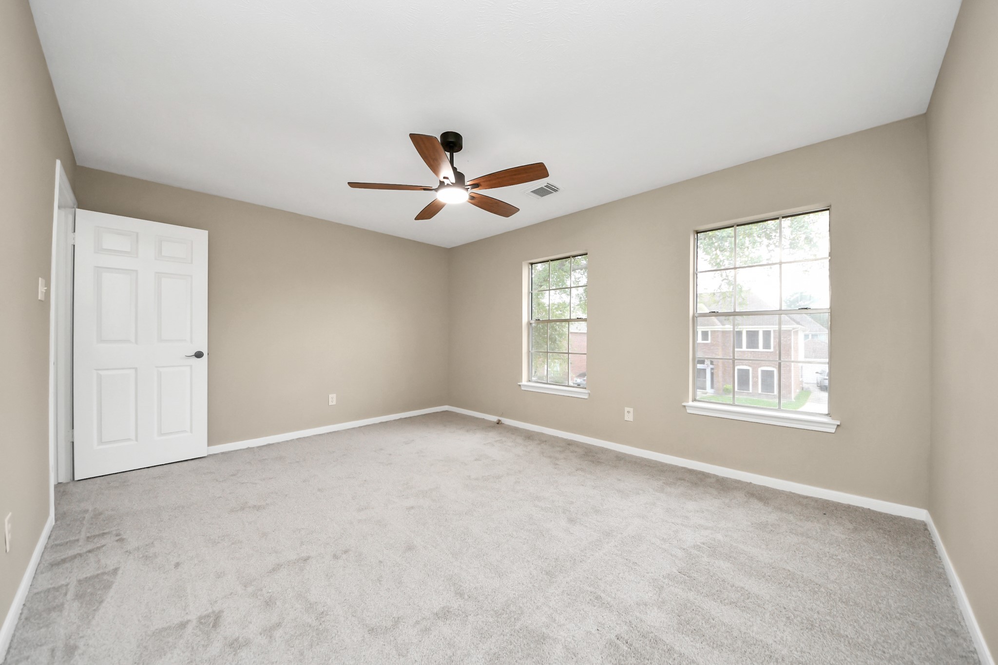 19030 Keyturn Lane Humble, TX 77346 - Photo 31 of 50 a view of an empty room with a window