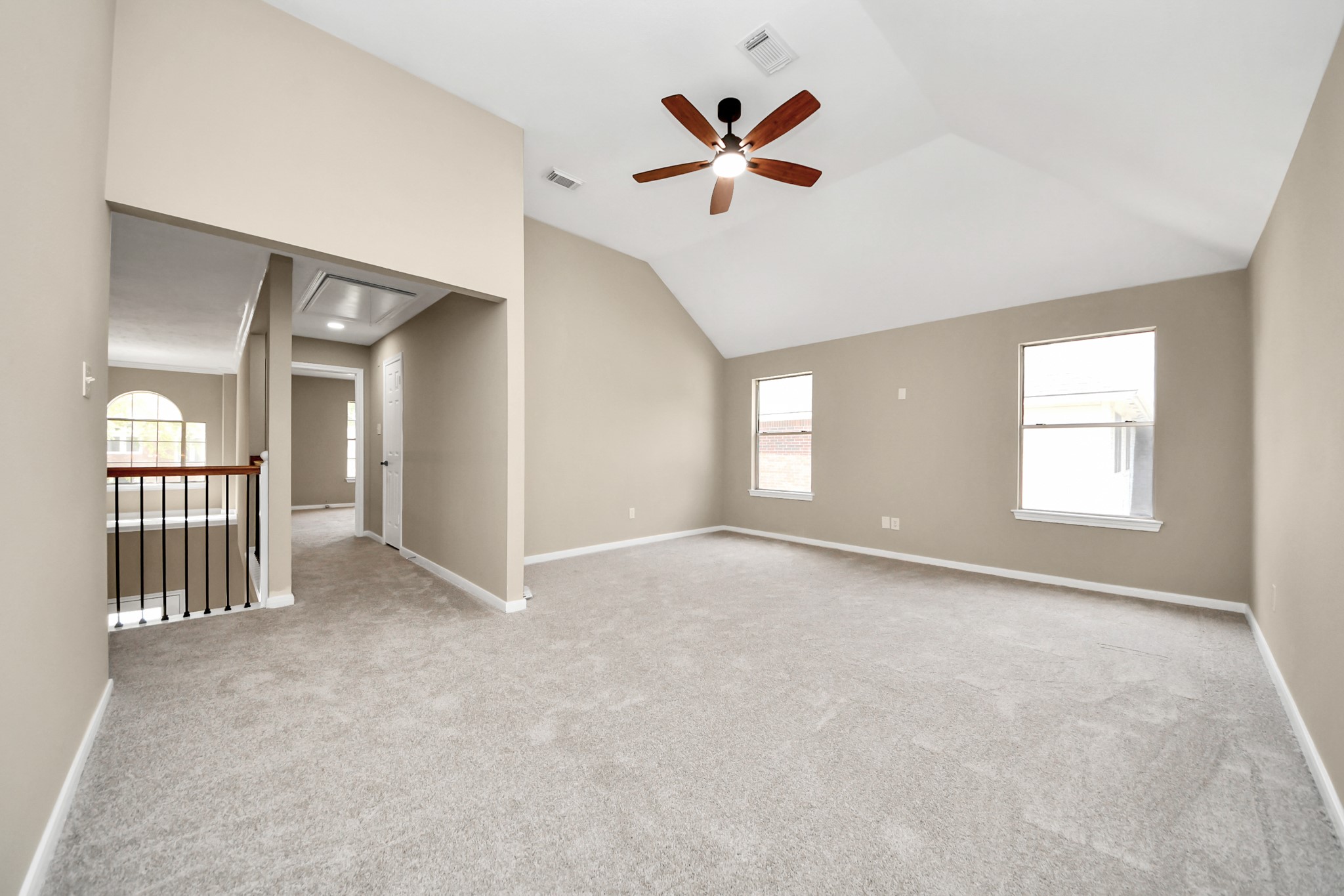 19030 Keyturn Lane Humble, TX 77346 - Photo 33 of 50 an empty room with windows and fan