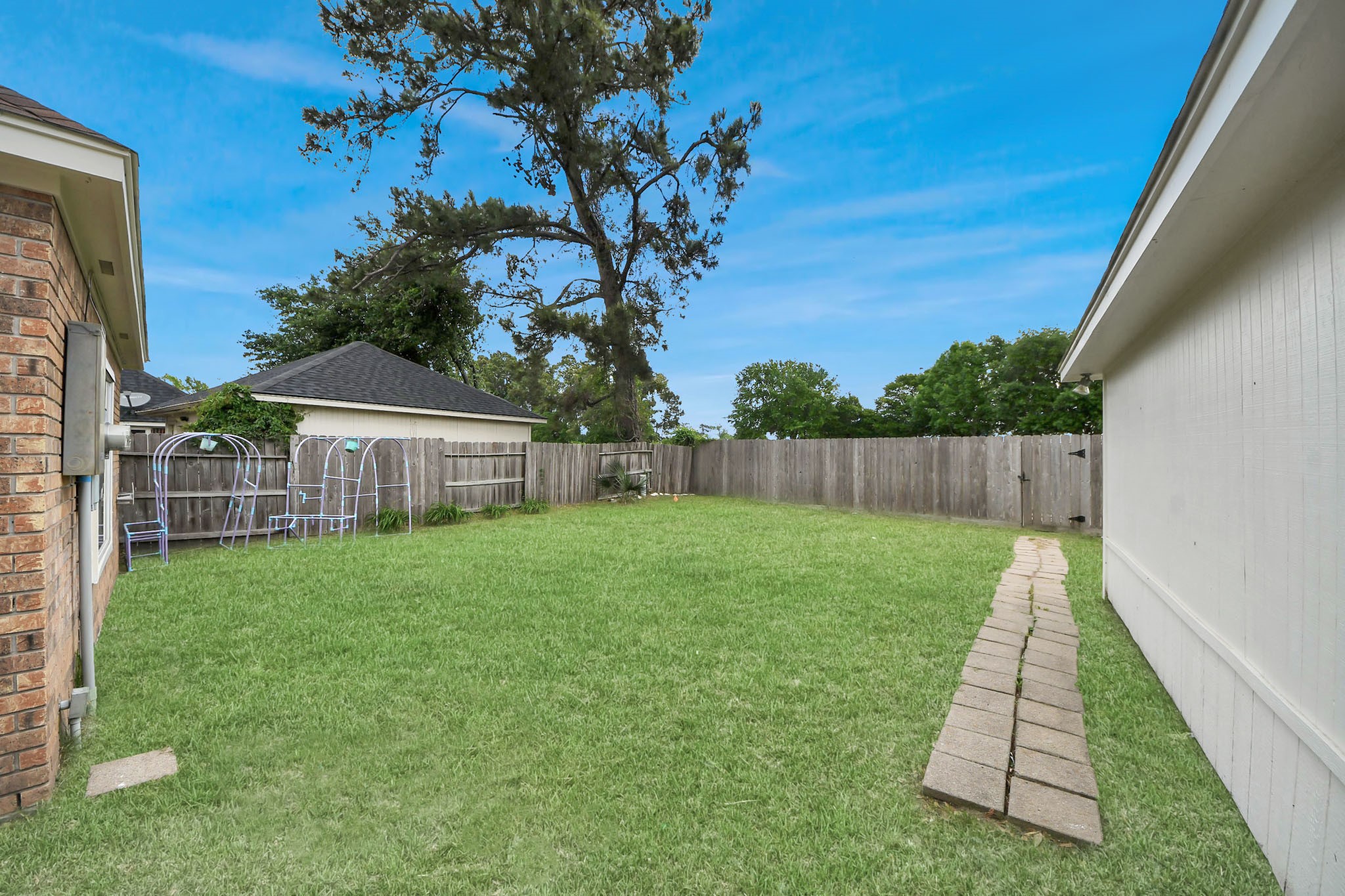 19030 Keyturn Lane Humble, TX 77346 - Photo 44 of 50 a view of backyard with green space