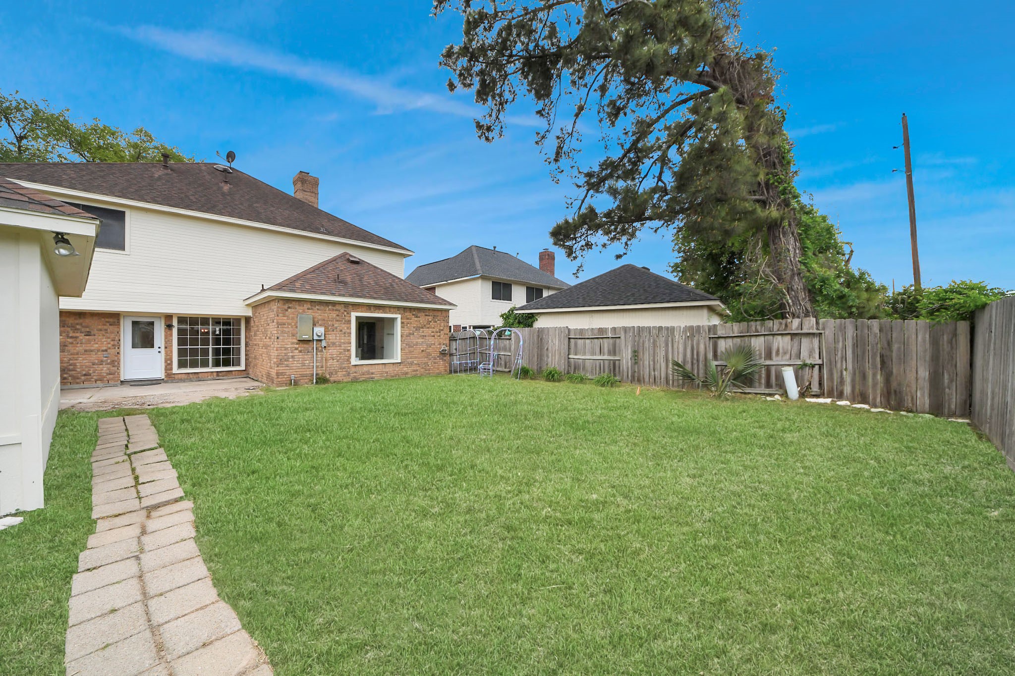 19030 Keyturn Lane Humble, TX 77346 - Photo 45 of 50 a front view of a house with a garden