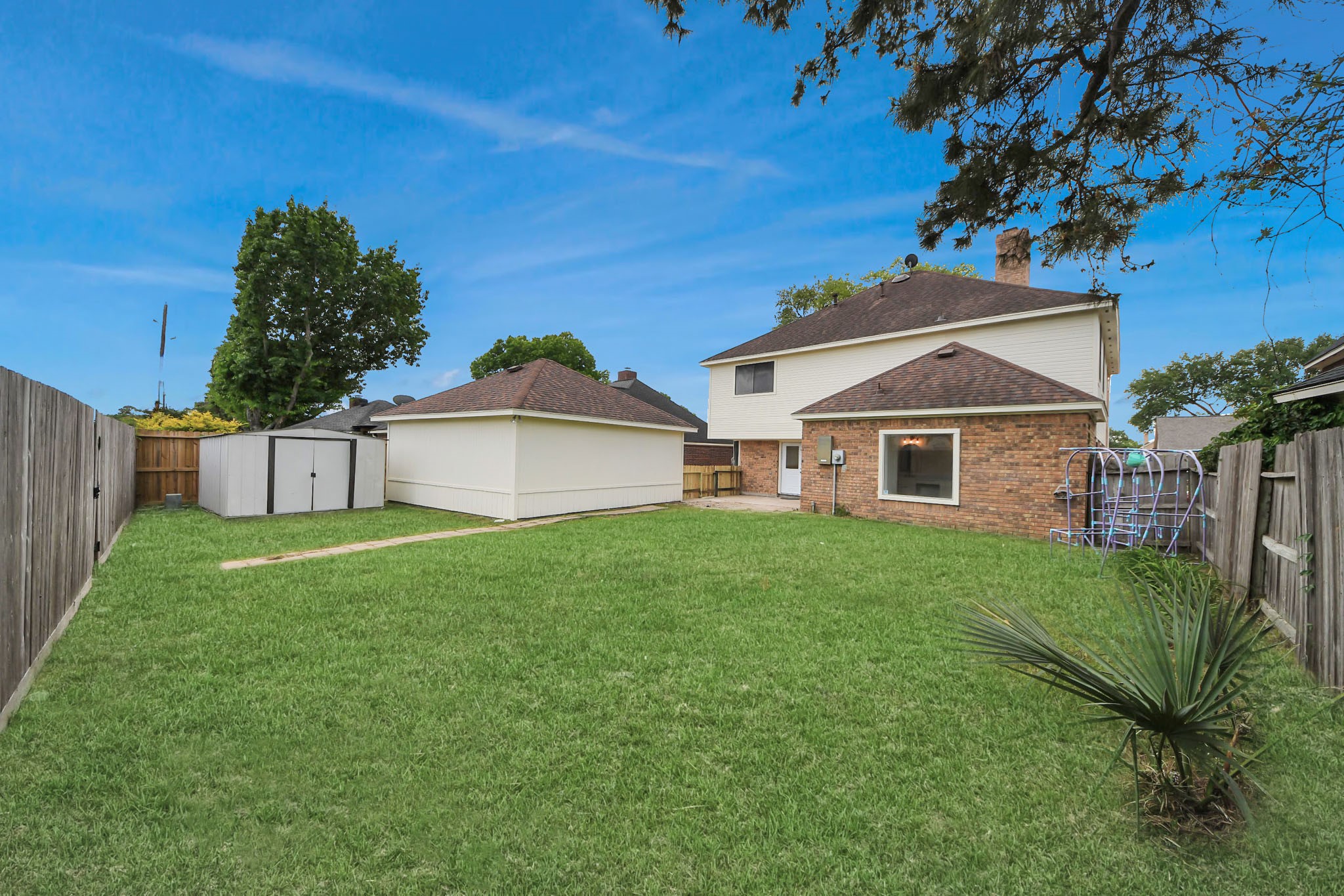 19030 Keyturn Lane Humble, TX 77346 - Photo 46 of 50 a view of a house with a yard
