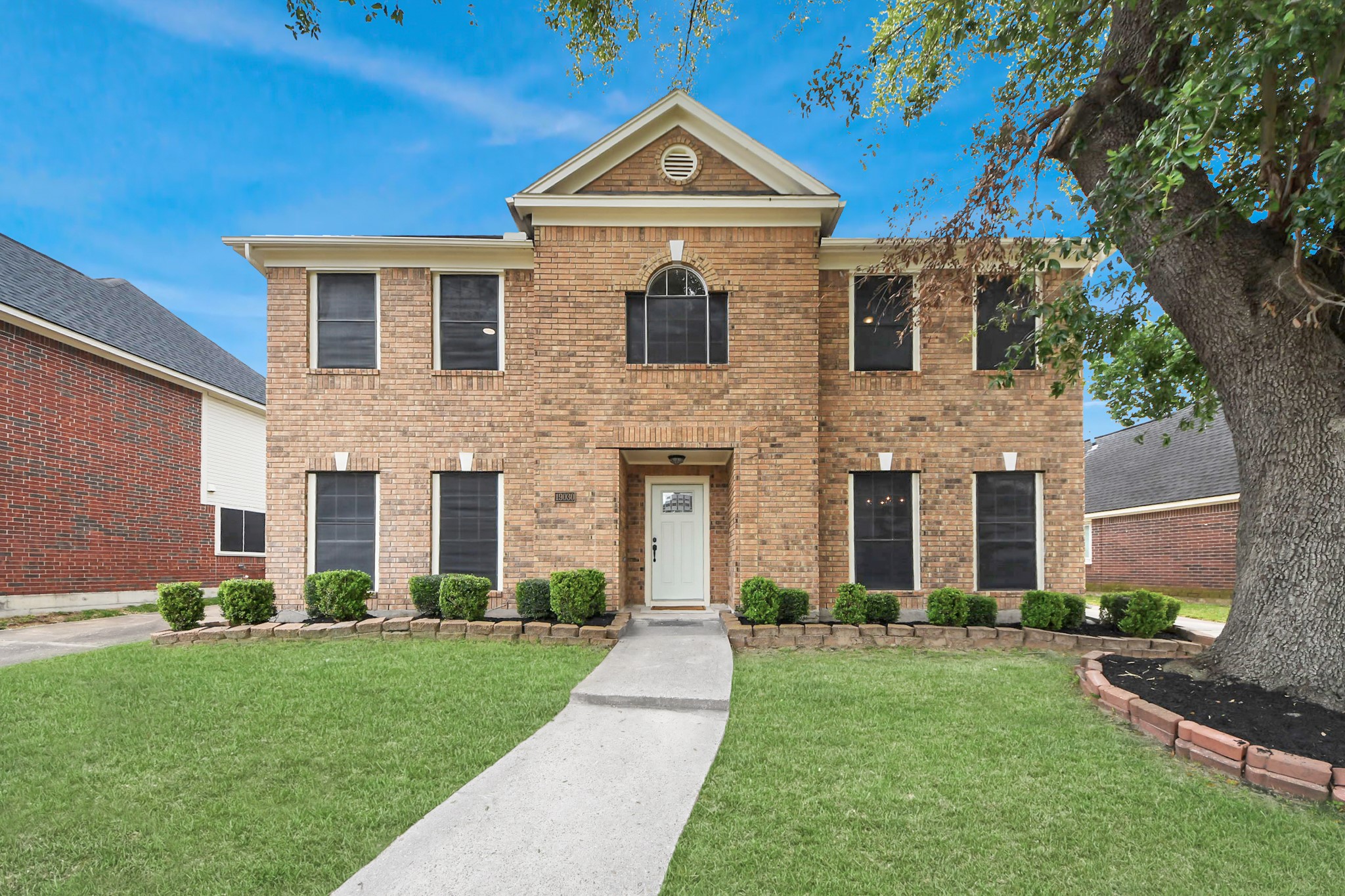19030 Keyturn Lane Humble, TX 77346 - Photo 47 of 50 a front view of house with yard and green space