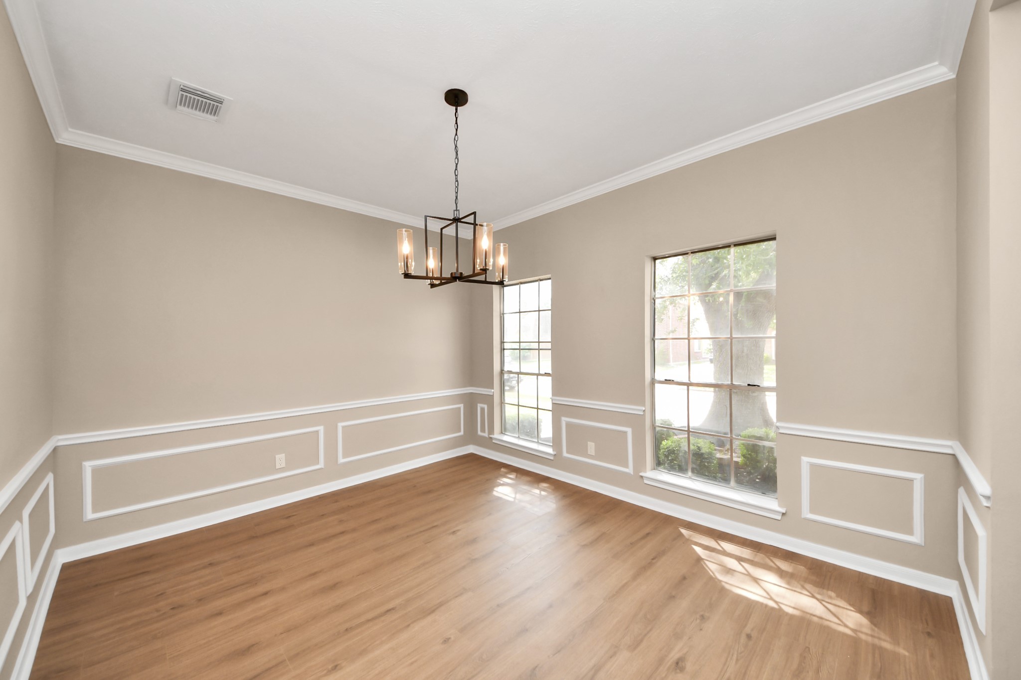 19030 Keyturn Lane Humble, TX 77346 - Photo 6 of 50 a view of empty room with wooden floor and window