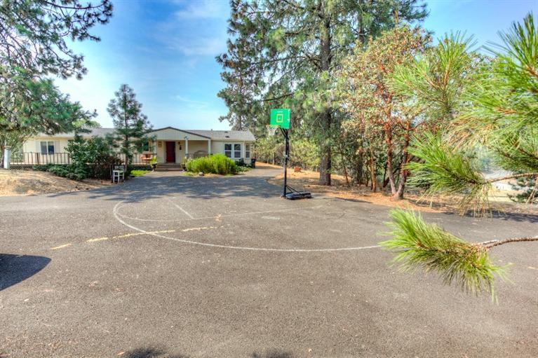 2388 Old Military Road Central Point, OR 97502 - Photo 11 of 35 a view of a house with a street