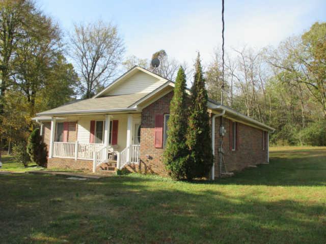 3280 Bethel Road Pulaski, TN 38478 - Photo 1 of 20 a front view of house with yard and green space