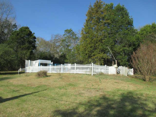 3280 Bethel Road Pulaski, TN 38478 - Photo 19 of 20 a view of a swimming pool with a bench