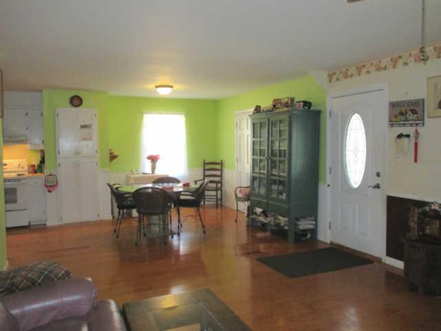 3280 Bethel Road Pulaski, TN 38478 - Photo 4 of 20 a living room with fireplace furniture and a chandelier