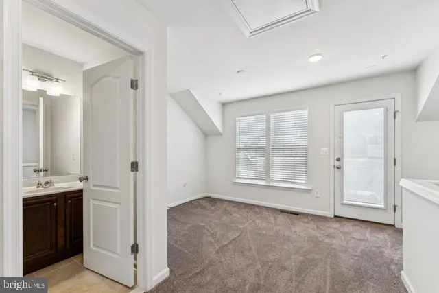 a view of a kitchen with a sink and dishwasher kitchen view