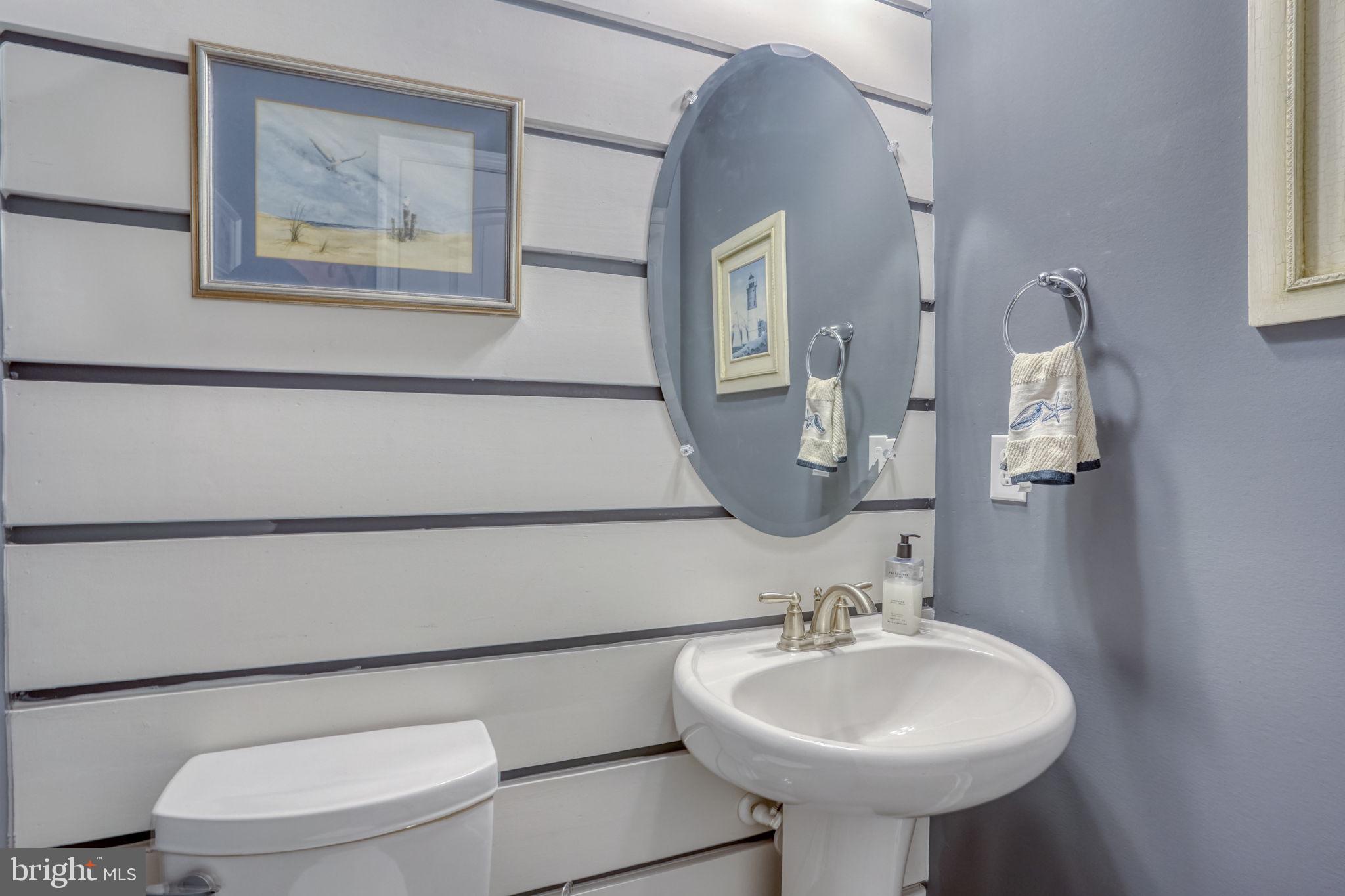 15272 Crape Myrtle Road Milton, DE 19968 - Photo 26 of 61 Charming bathroom with coastal accents.