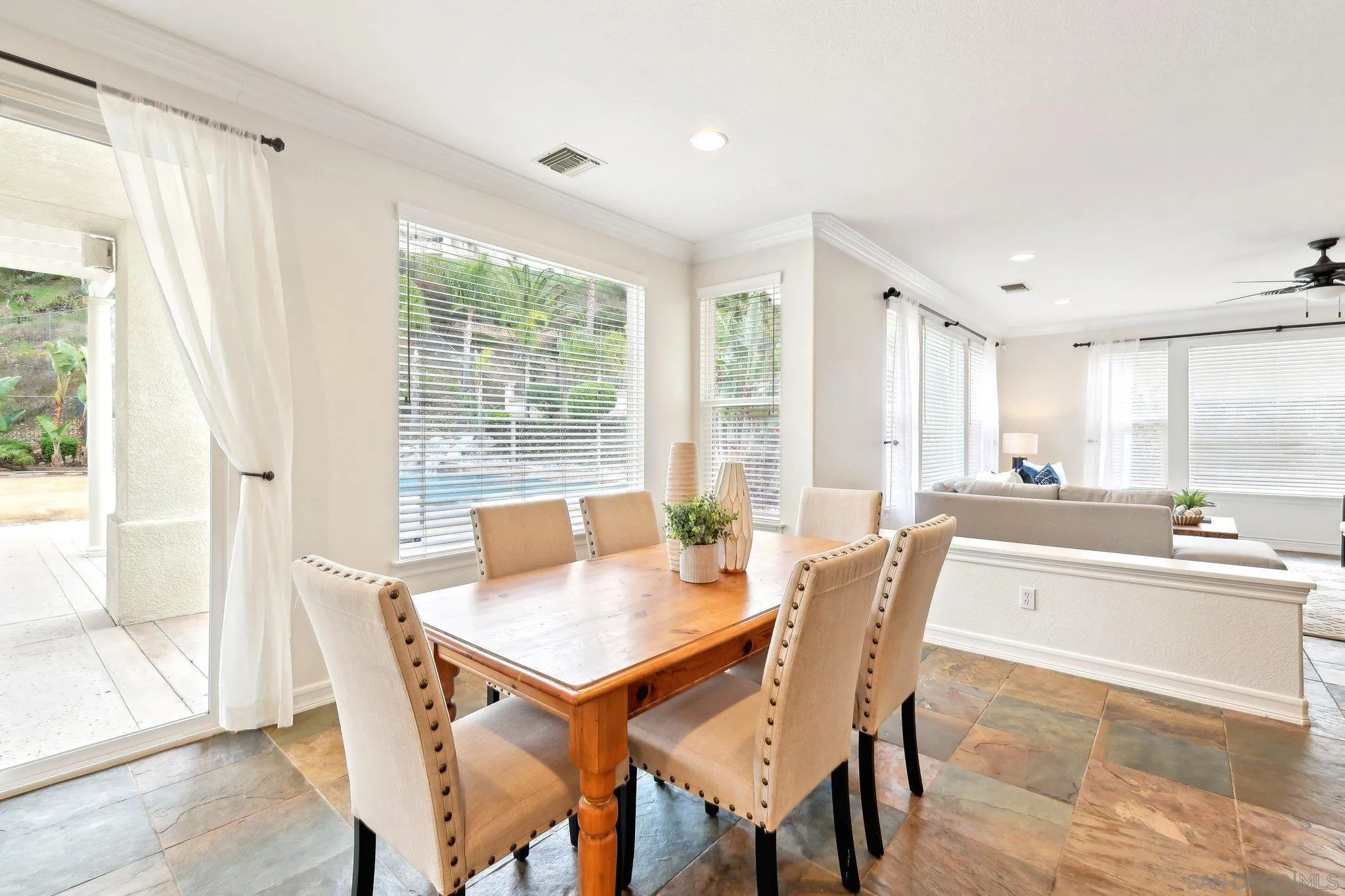 11781 Treadwell Drive Poway, CA 92064 - Photo 18 of 63 a view of a dining room with furniture window and outside view