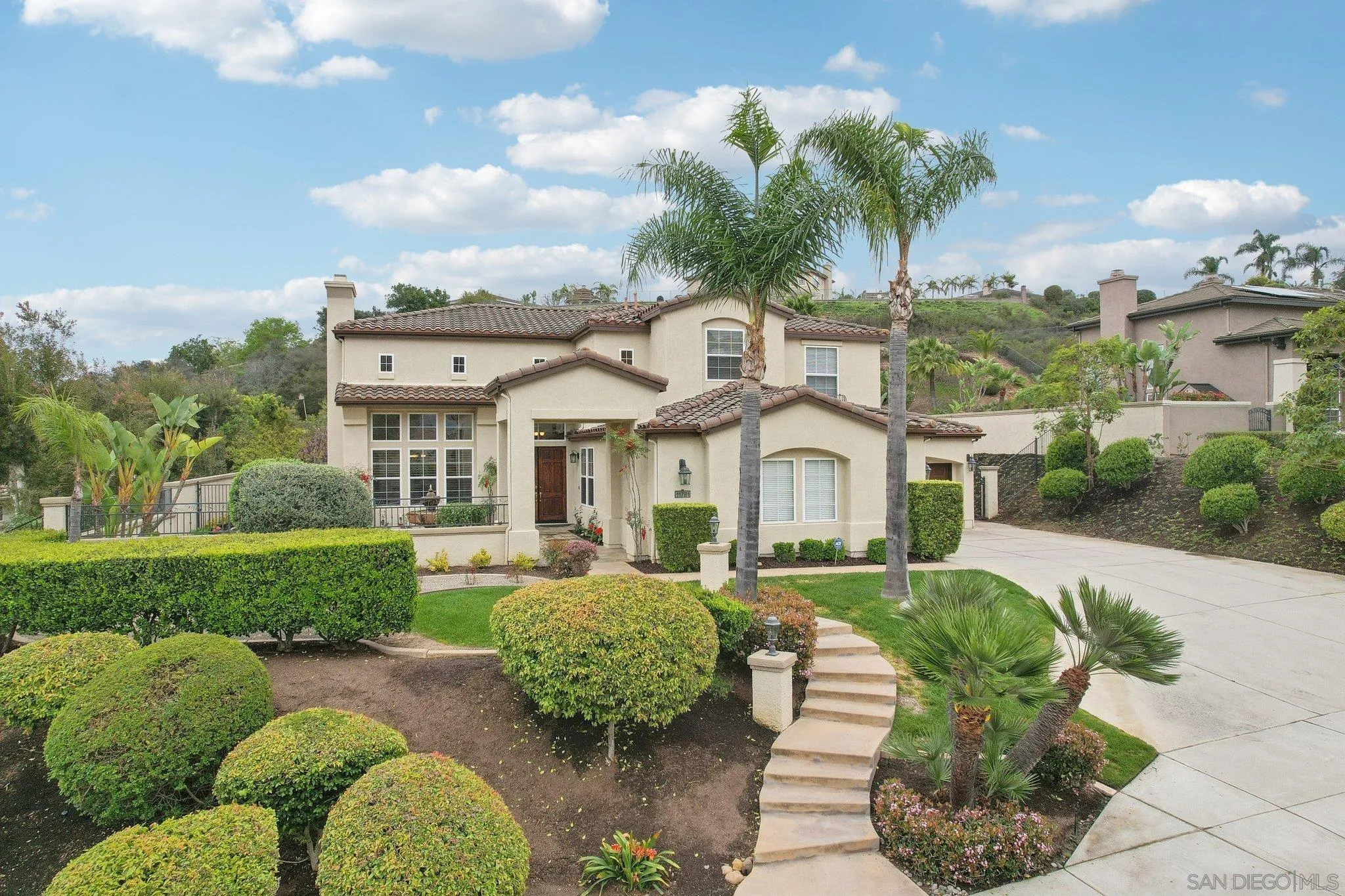 11781 Treadwell Drive Poway, CA 92064 - Photo 2 of 63 a front view of a house with garden