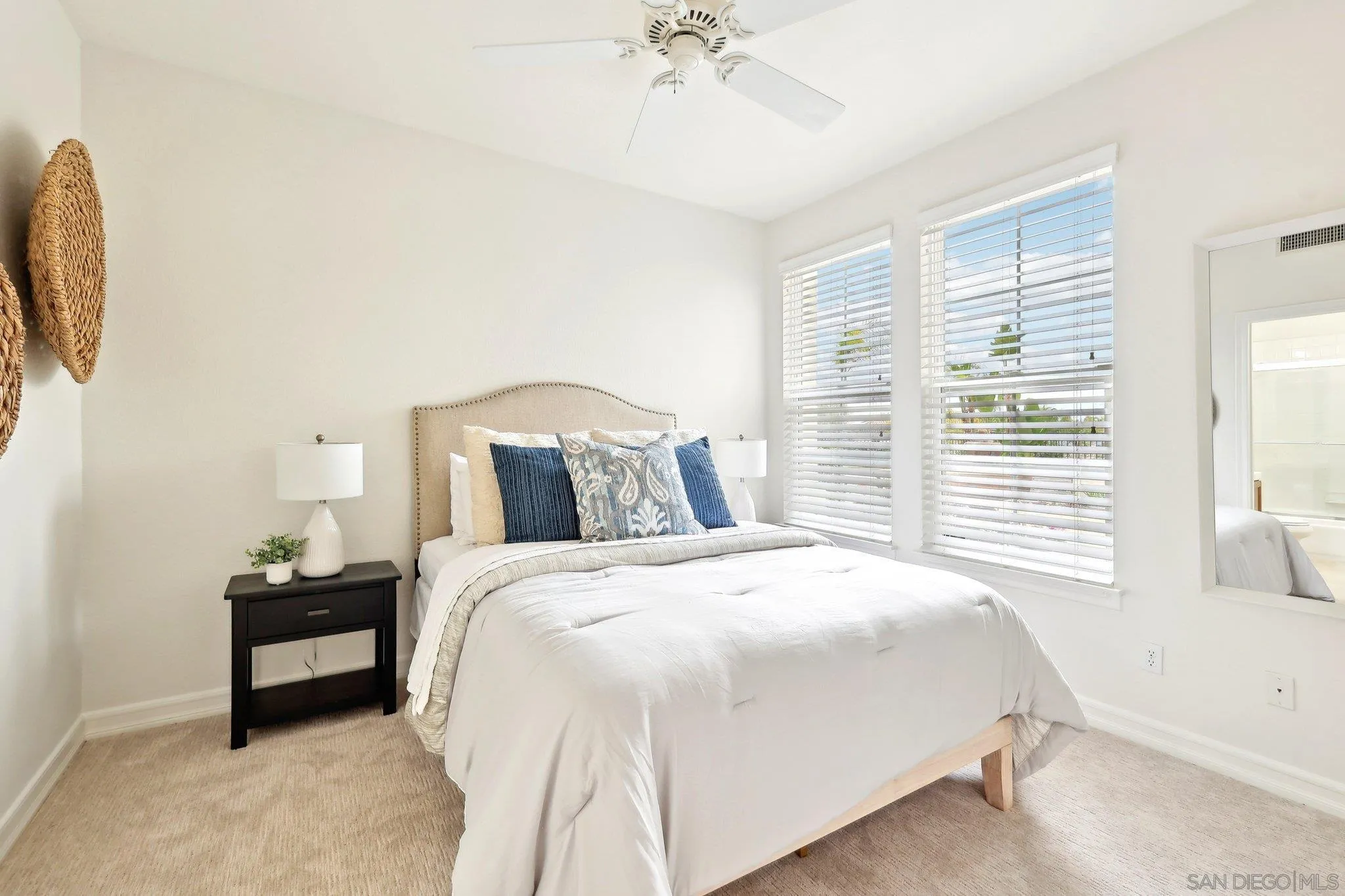 11781 Treadwell Drive Poway, CA 92064 - Photo 25 of 63 a bedroom with a bed and a chandelier