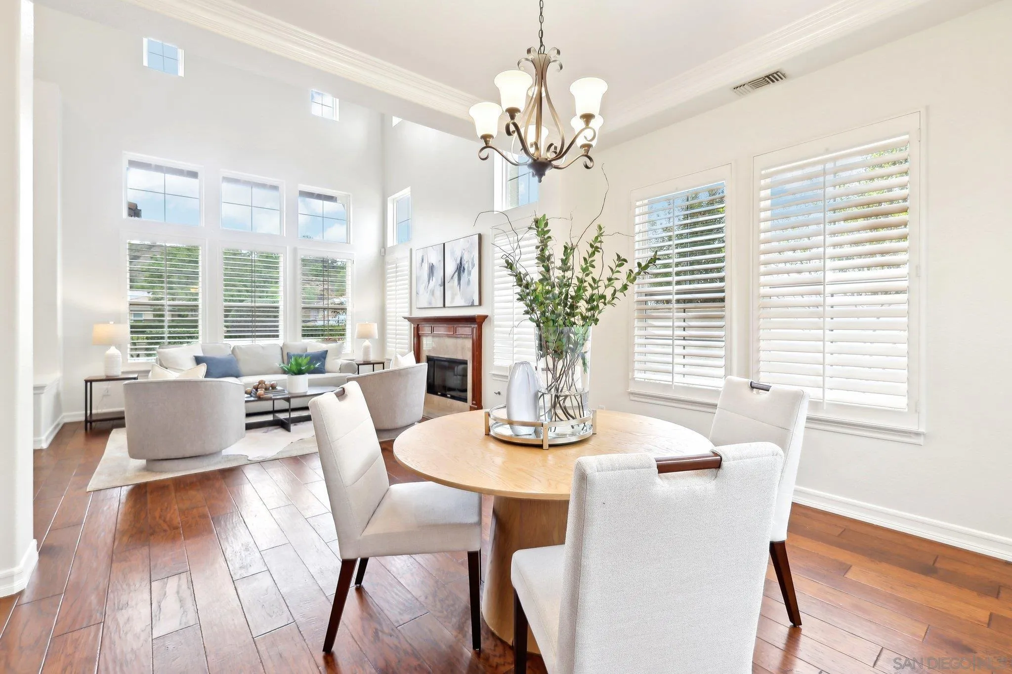 11781 Treadwell Drive Poway, CA 92064 - Photo 9 of 63 a view of a dining room with furniture wooden floor and chandelier