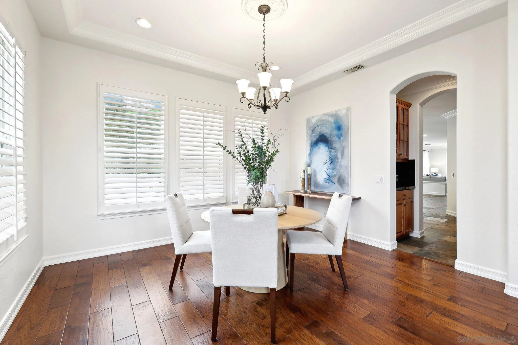 11781 Treadwell Drive Poway, CA 92064 - Photo 10 of 63 a view of a dining room with furniture window and wooden floor
