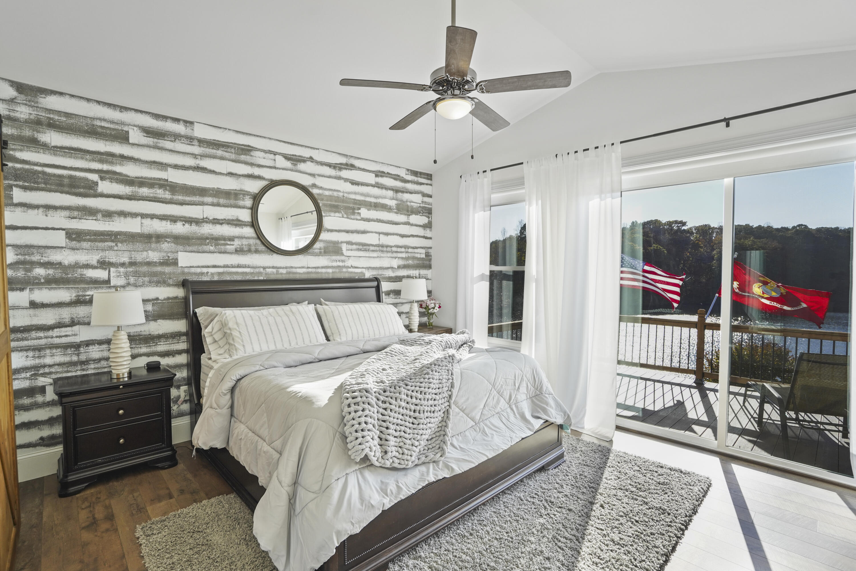 11 Old Point Road Moneta, VA 24121 - Photo 14 of 49 a bedroom with a bed and a chandelier