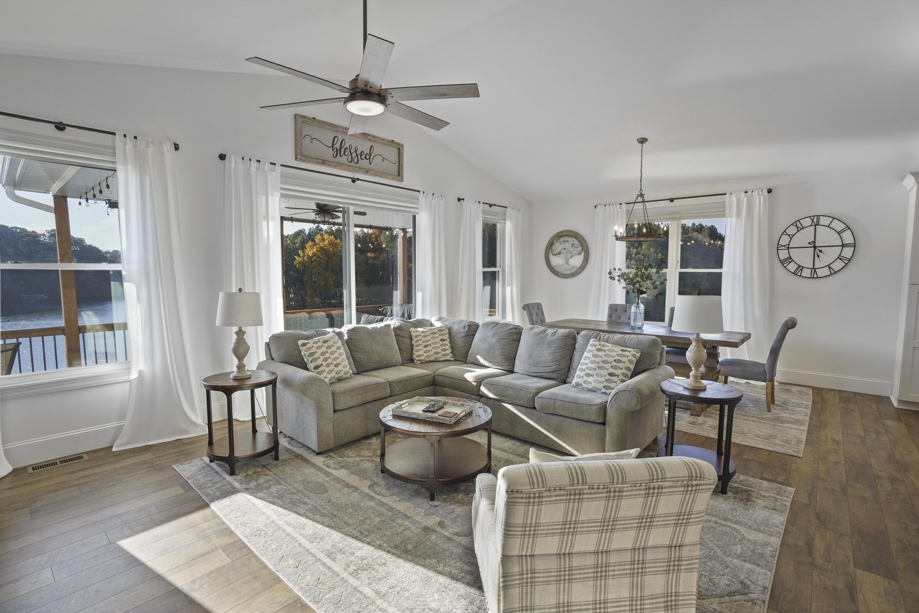 11 Old Point Road Moneta, VA 24121 - Photo 6 of 49 a living room with furniture a chandelier and a window
