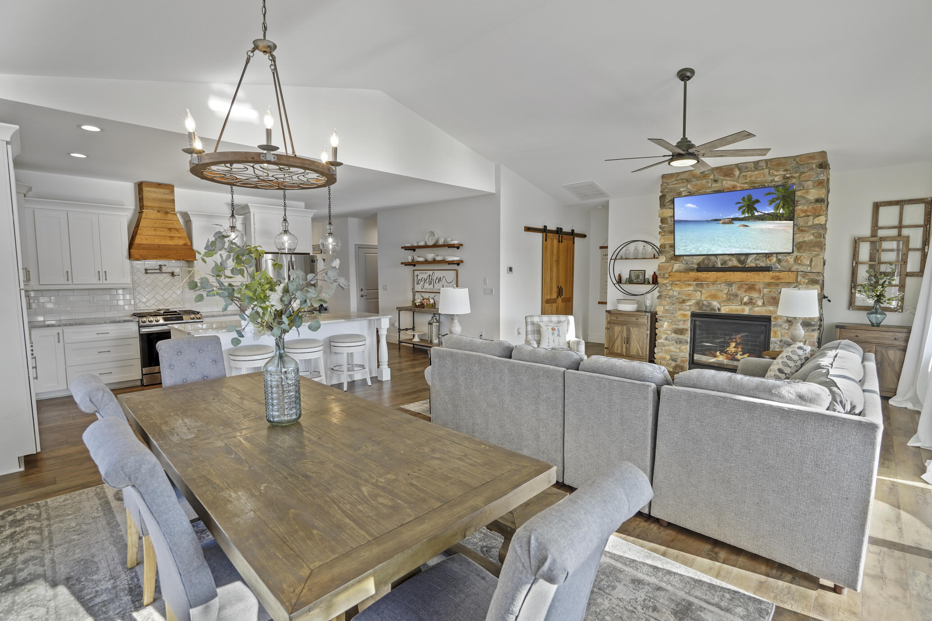 11 Old Point Road Moneta, VA 24121 - Photo 8 of 49 a dining room with furniture a chandelier and wooden floor