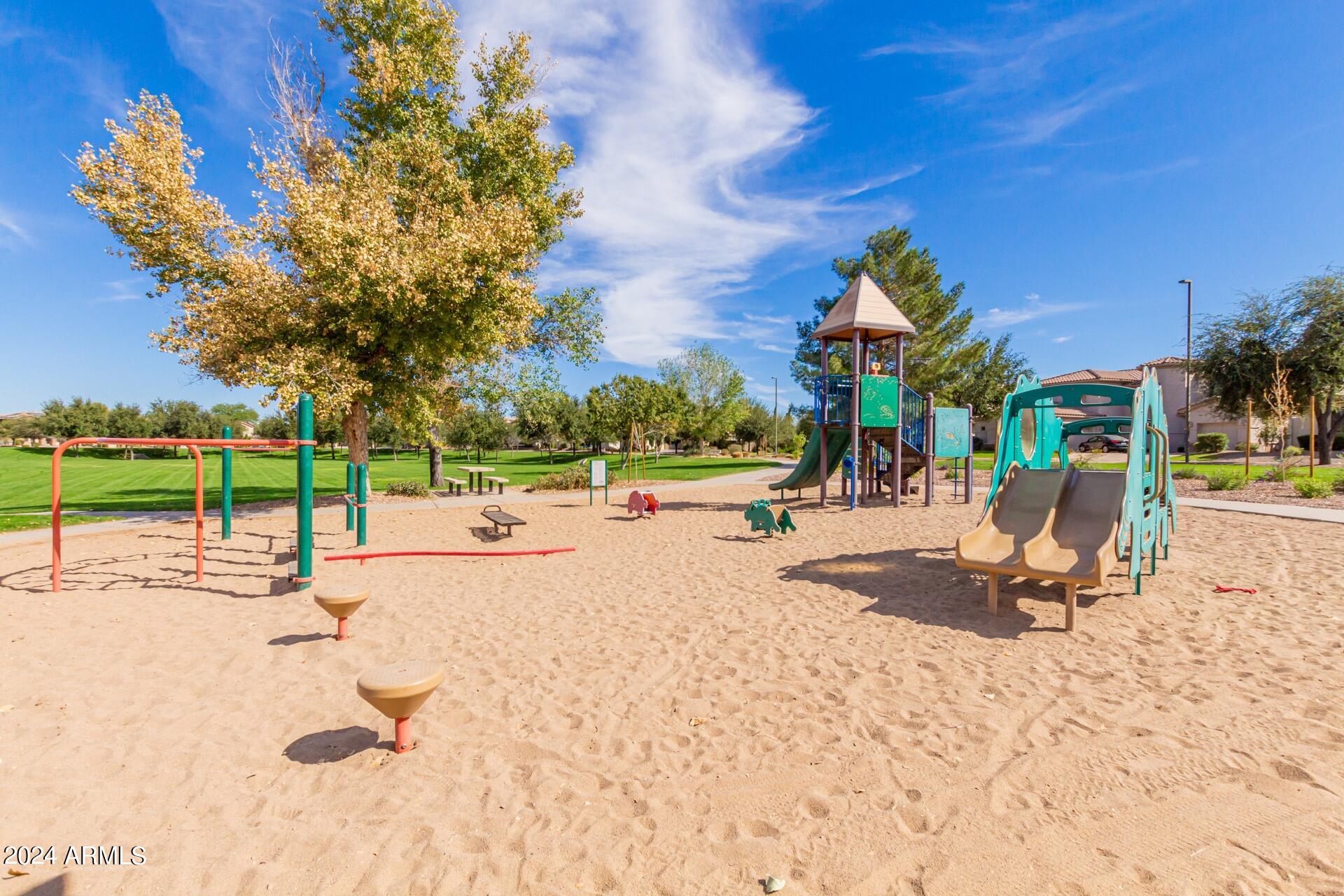 4333 South Rim Court Gilbert, AZ 85297 - Photo 58 of 77 a view of a park with swings and slides