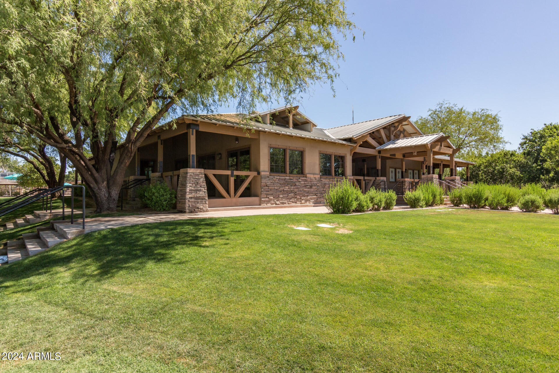 4333 South Rim Court Gilbert, AZ 85297 - Photo 72 of 77 a front view of a house with garden