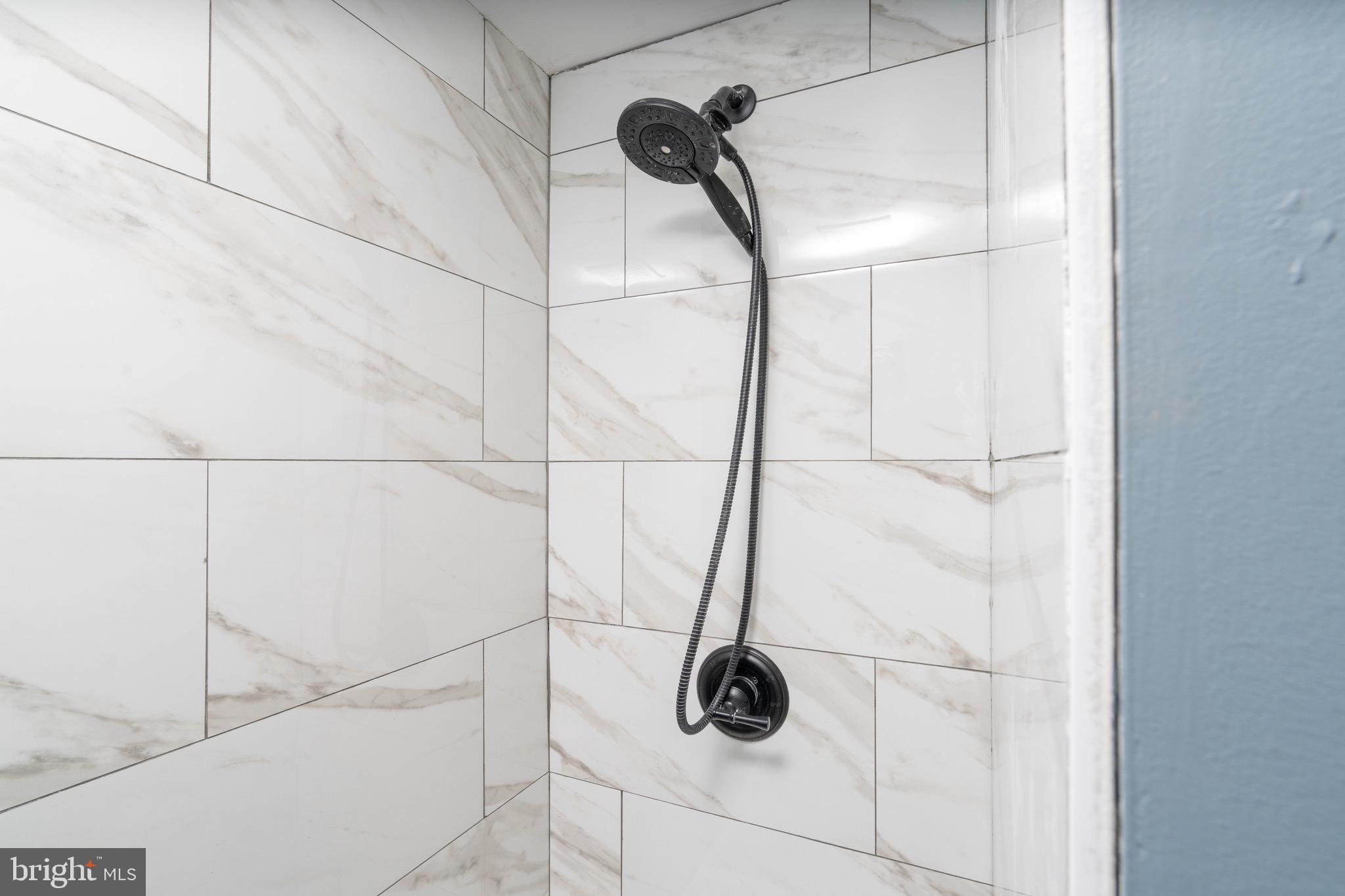 960 Carmel Road Millville, NJ 08332 - Photo 21 of 35 a bathroom with a shower