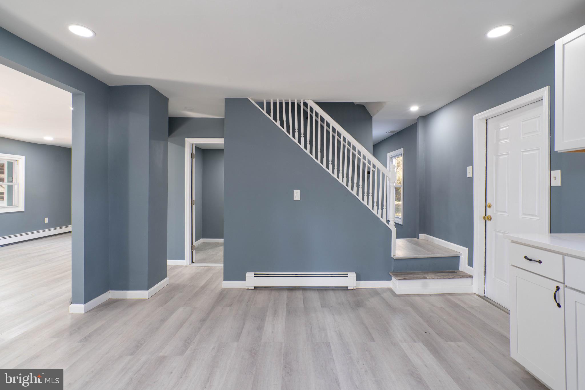 960 Carmel Road Millville, NJ 08332 - Photo 9 of 35 a view of entryway and hall with wooden floor
