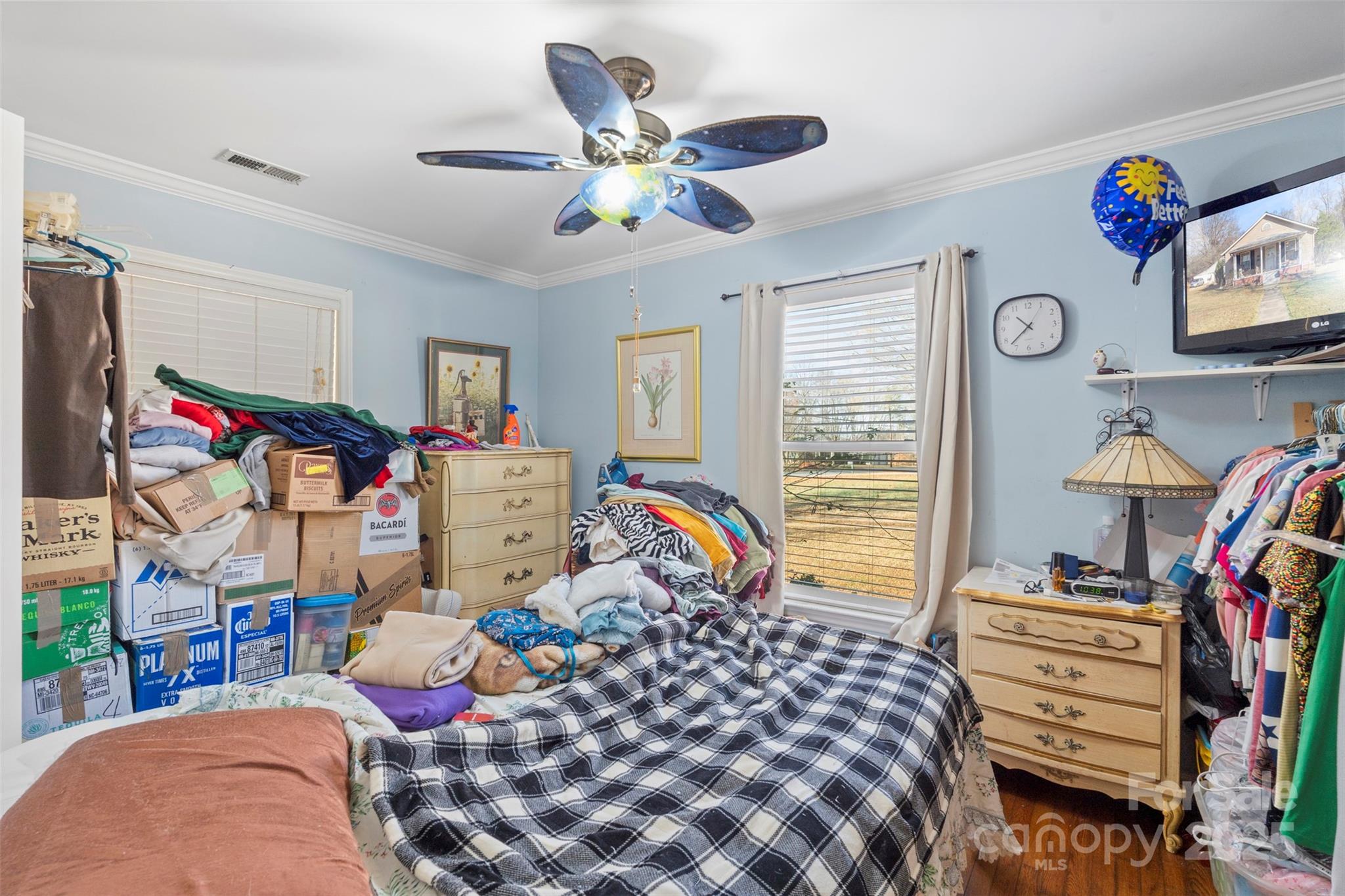 1580 Pine Ridge Road China Grove, NC 28023 - Photo 19 of 35 a bedroom with bed and a chandelier