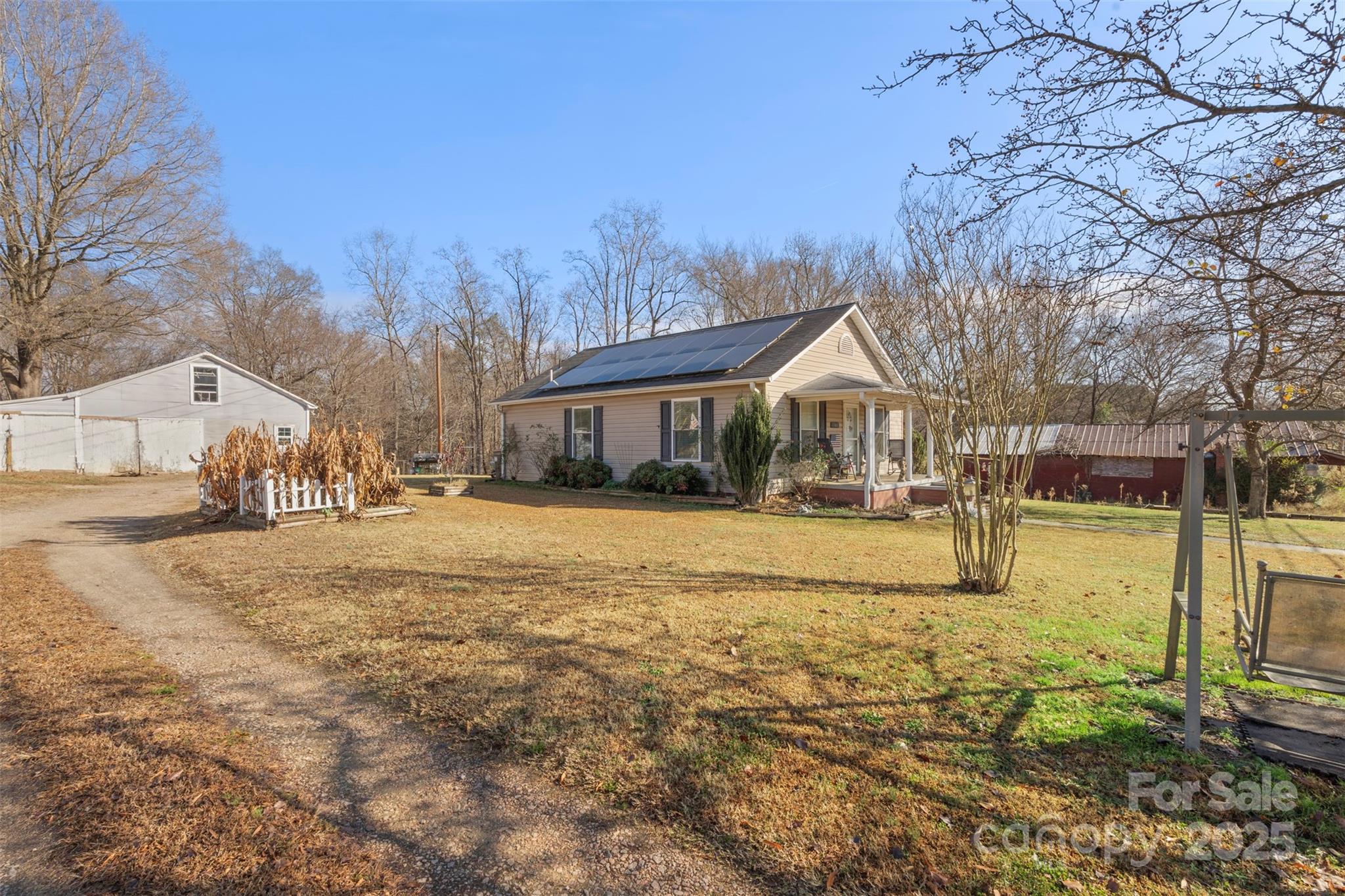 1580 Pine Ridge Road China Grove, NC 28023 - Photo 22 of 35 a view of house with outdoor space and swimming pool