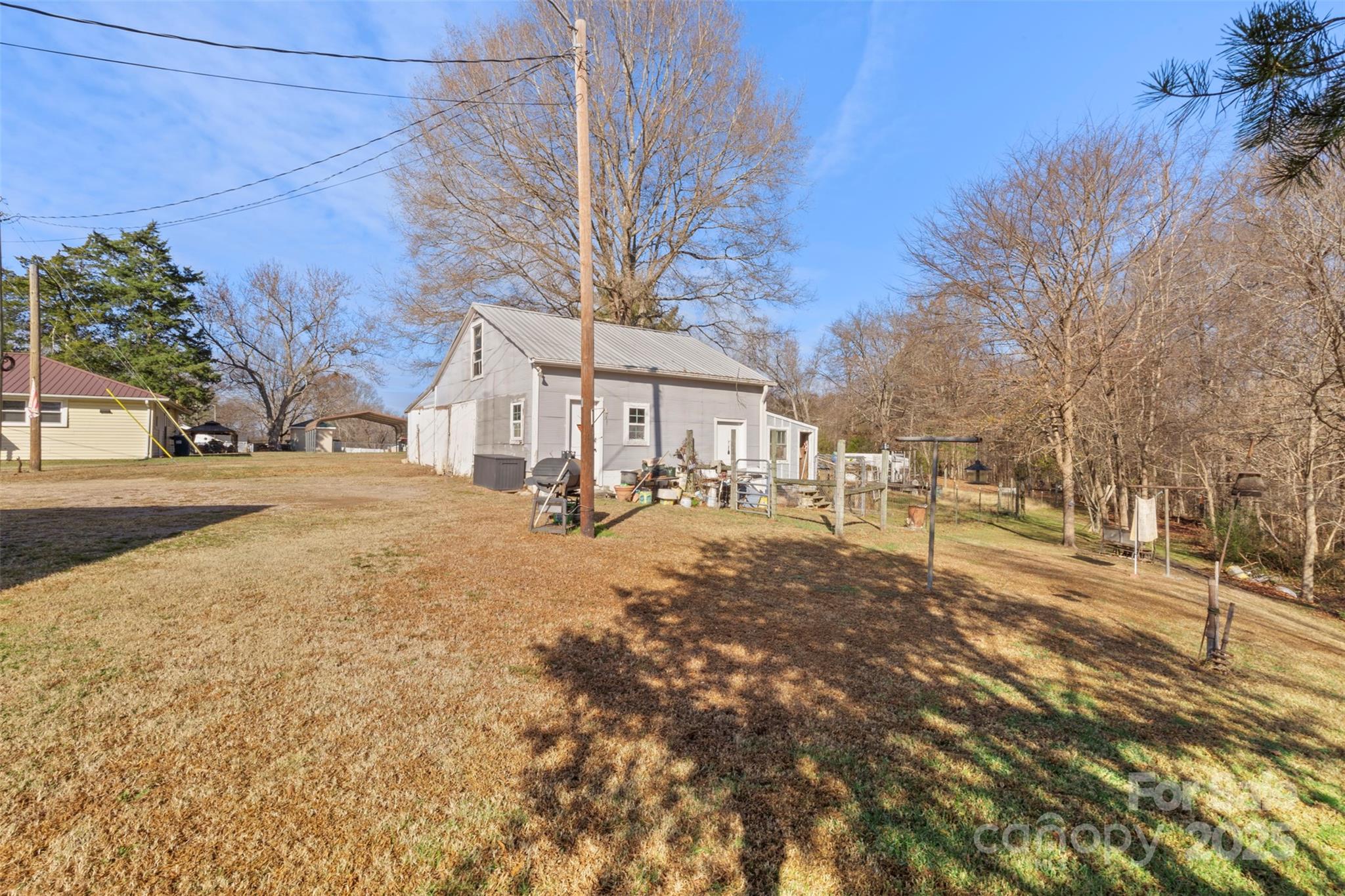 1580 Pine Ridge Road China Grove, NC 28023 - Photo 23 of 35 a pathway of a house with a yard