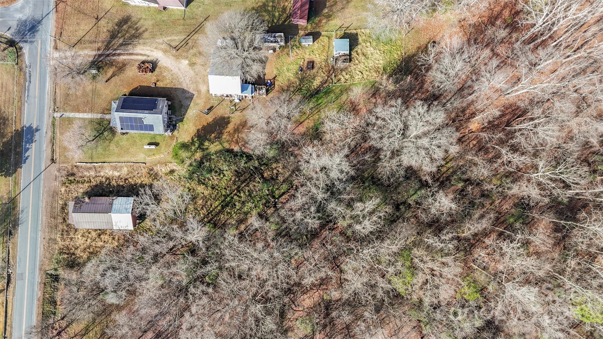 1580 Pine Ridge Road China Grove, NC 28023 - Photo 27 of 35 a aerial view of a building with a yard