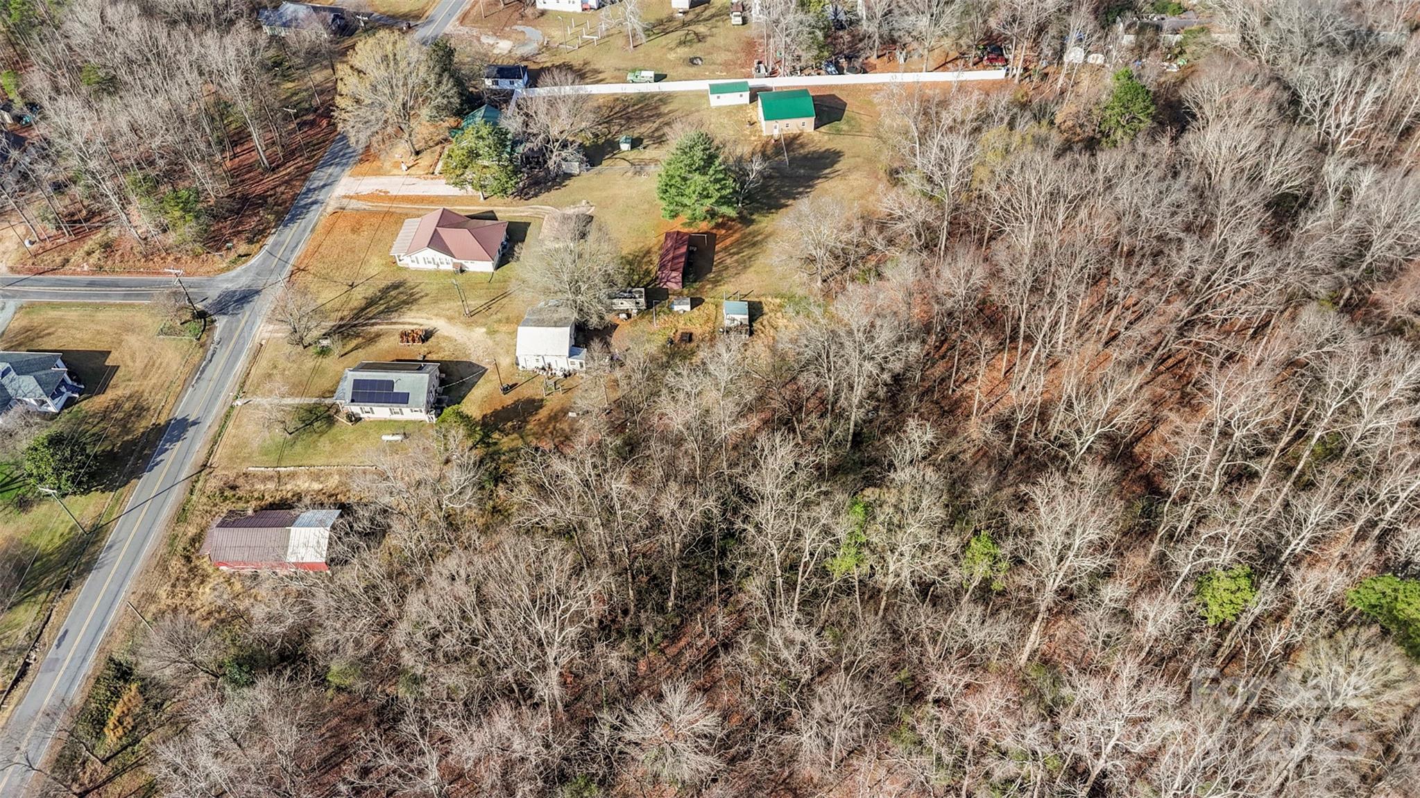 1580 Pine Ridge Road China Grove, NC 28023 - Photo 28 of 35 an aerial view of residential houses with outdoor space